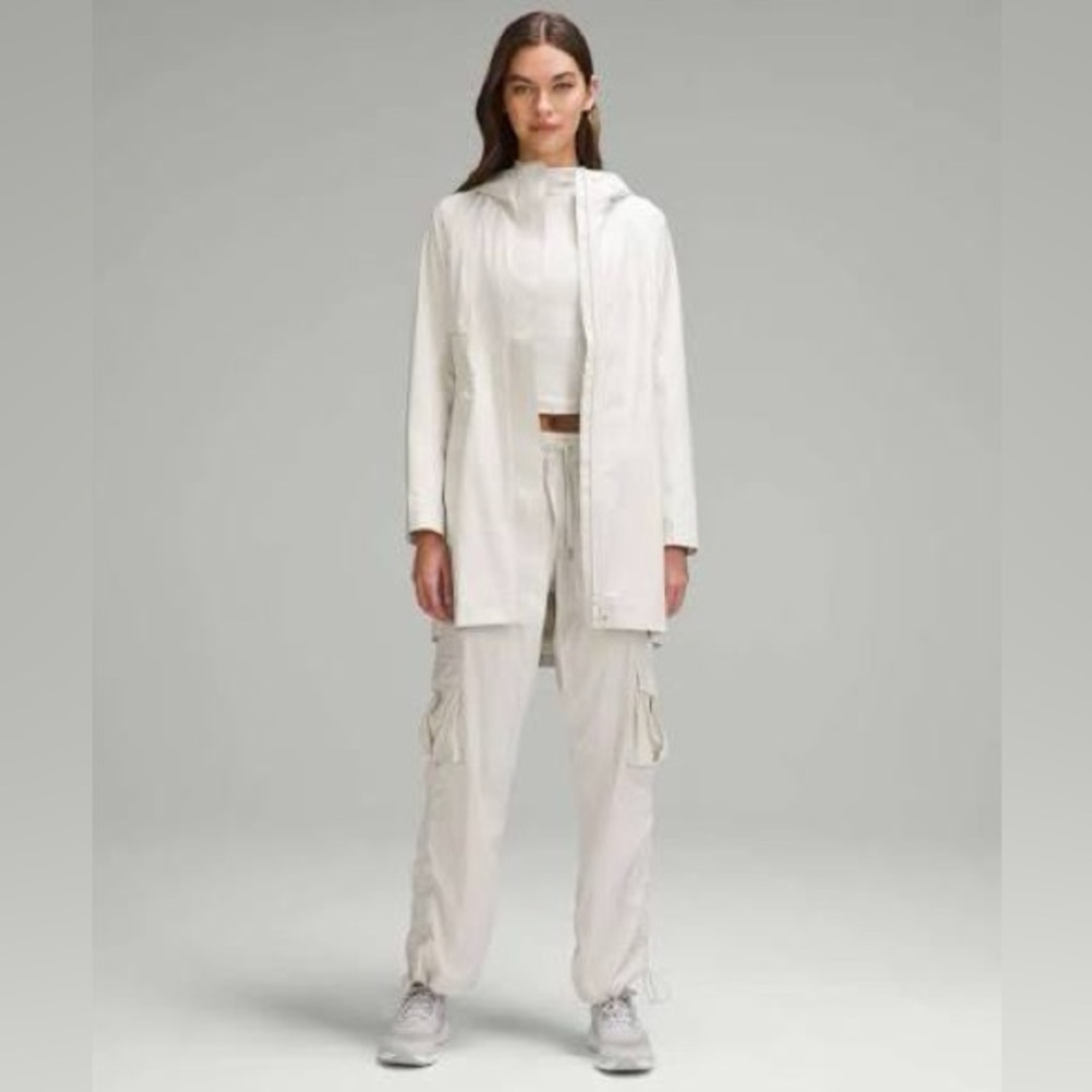 Lululemon “Rain Rebel” rain jacket in “Bone”. Size 2